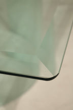 Side angle of Vintage Square Glass Coffee Table showing thickness and transparency of the glass material