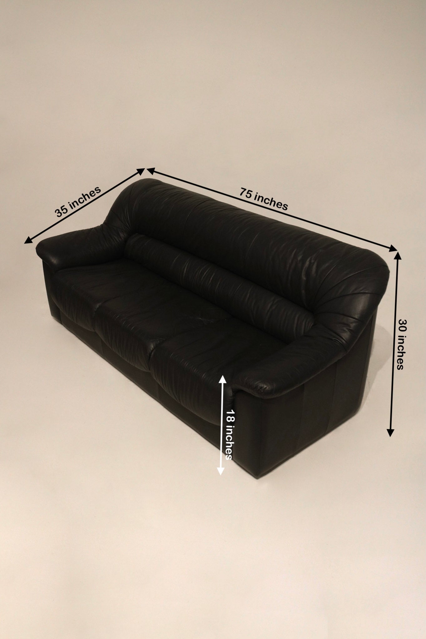 Dimensions of vintage Italian leather sofa couch shown in diagram: 75"L x 35"D x 30"H