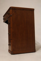 Overview image of walnut wood desk with both leaves extended and drawers visible, showcasing vintage storage function