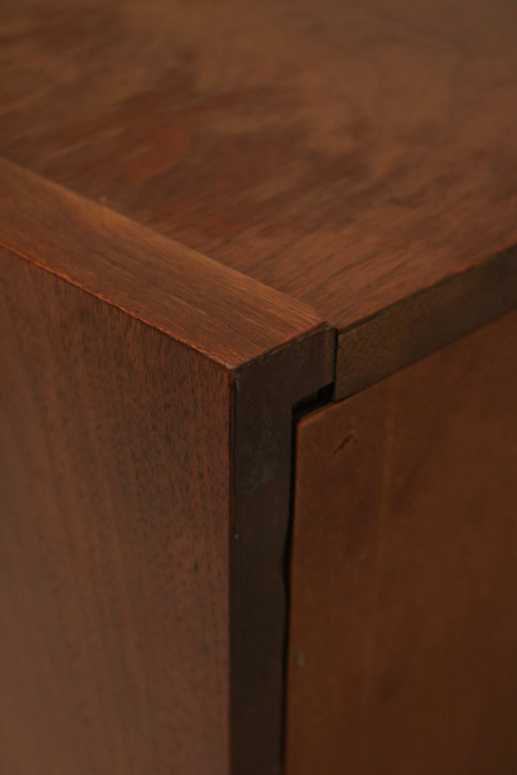 Back and joinery detail: rear panel and seam construction of Lane nightstand, showing assembly and vintage condition