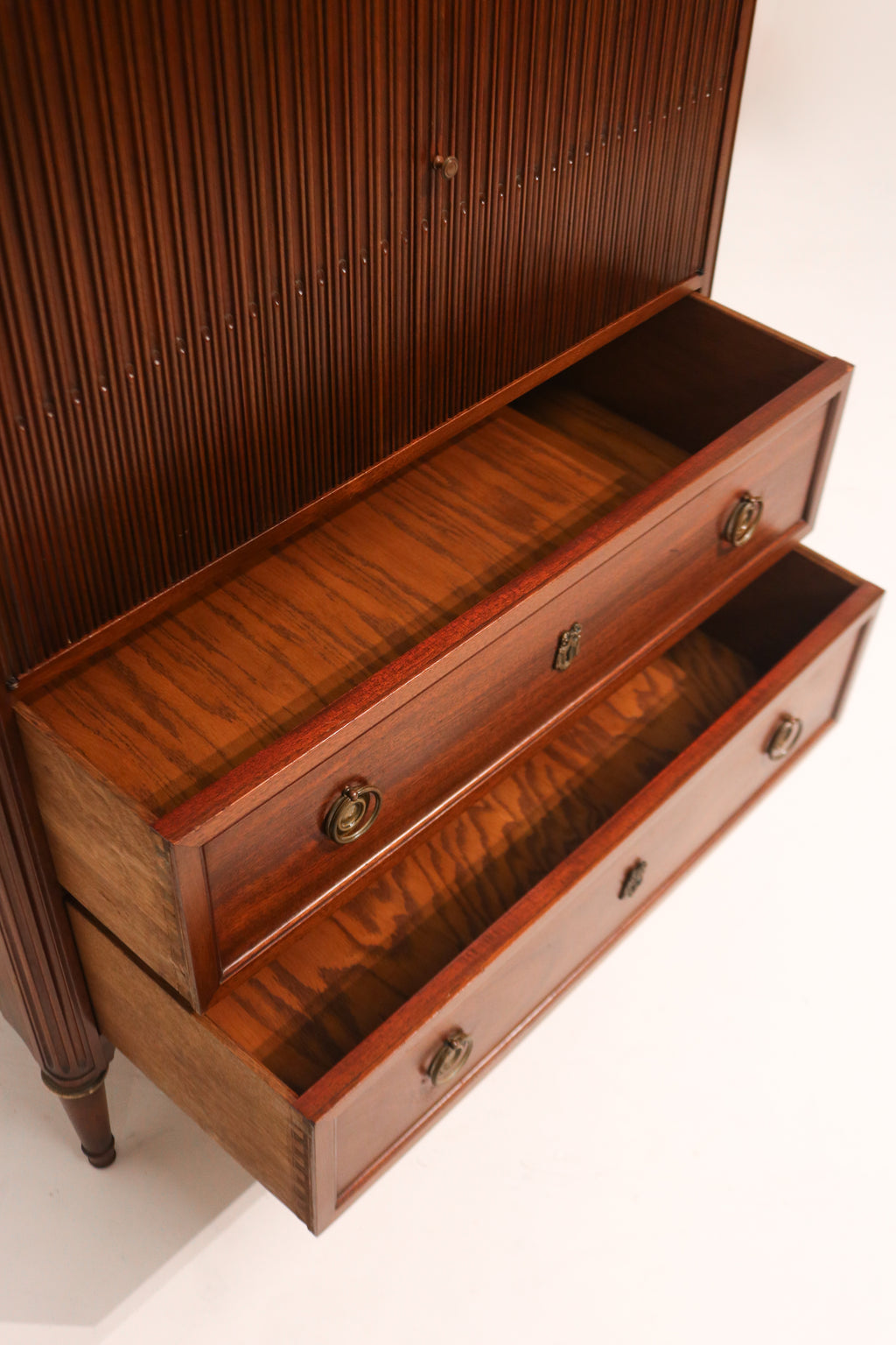 Drawer pulled halfway to reveal glide mechanism and sturdy construction