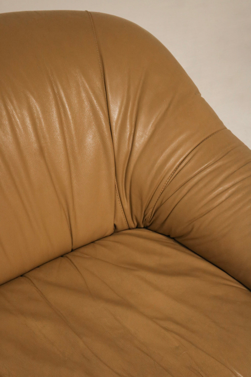 Underside view of vintage couch revealing support and build quality