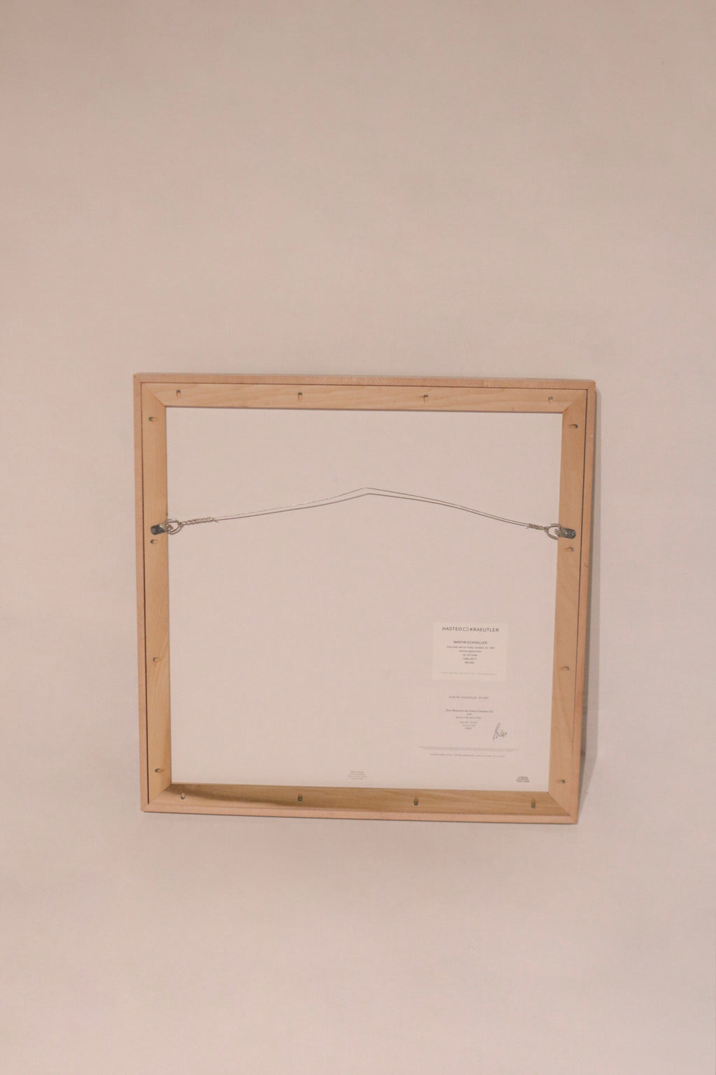 Martin Schoeller signature and edition label on wood frame of Tony Hawk photographic art