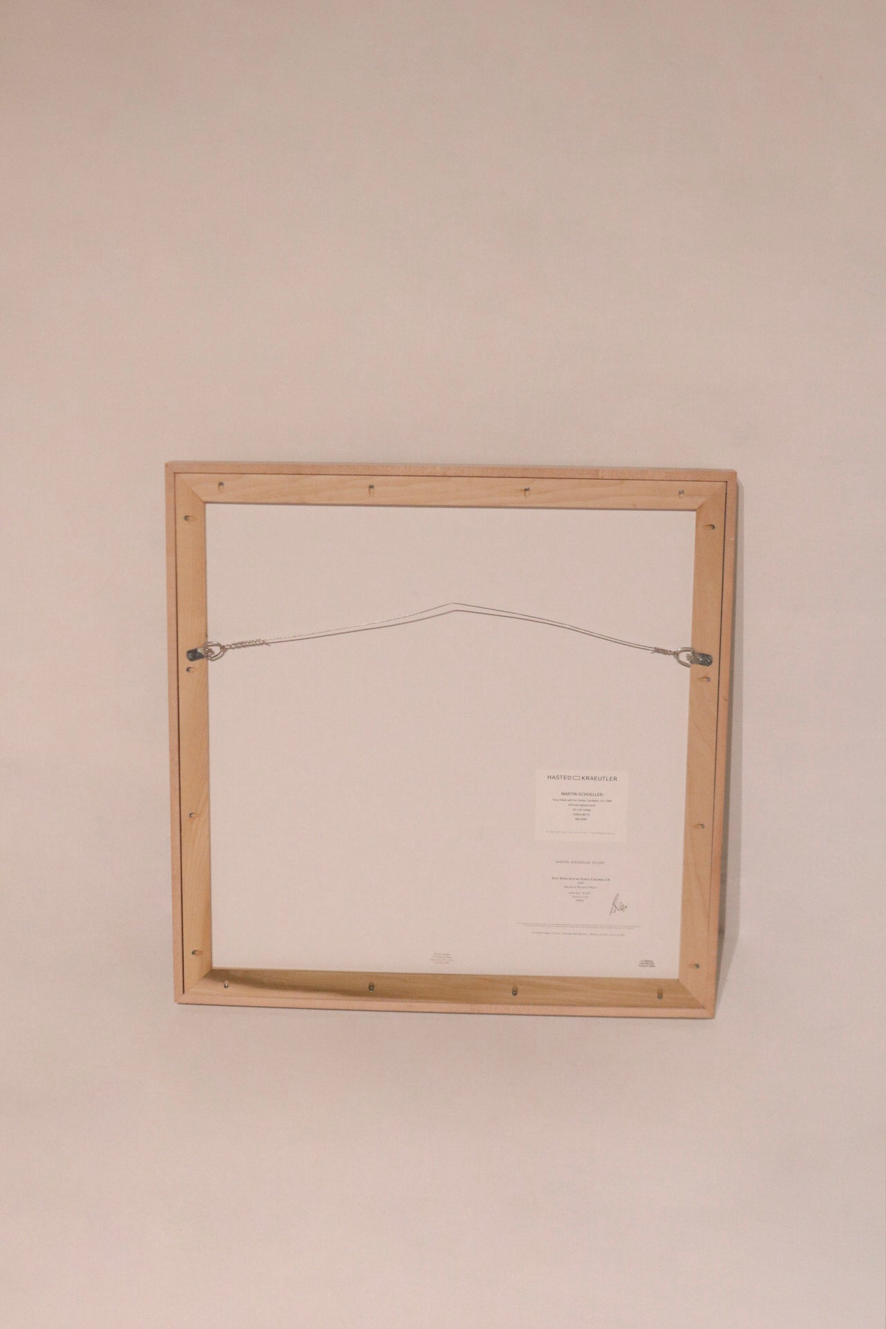 Martin Schoeller signature and edition label on wood frame of Tony Hawk photographic art