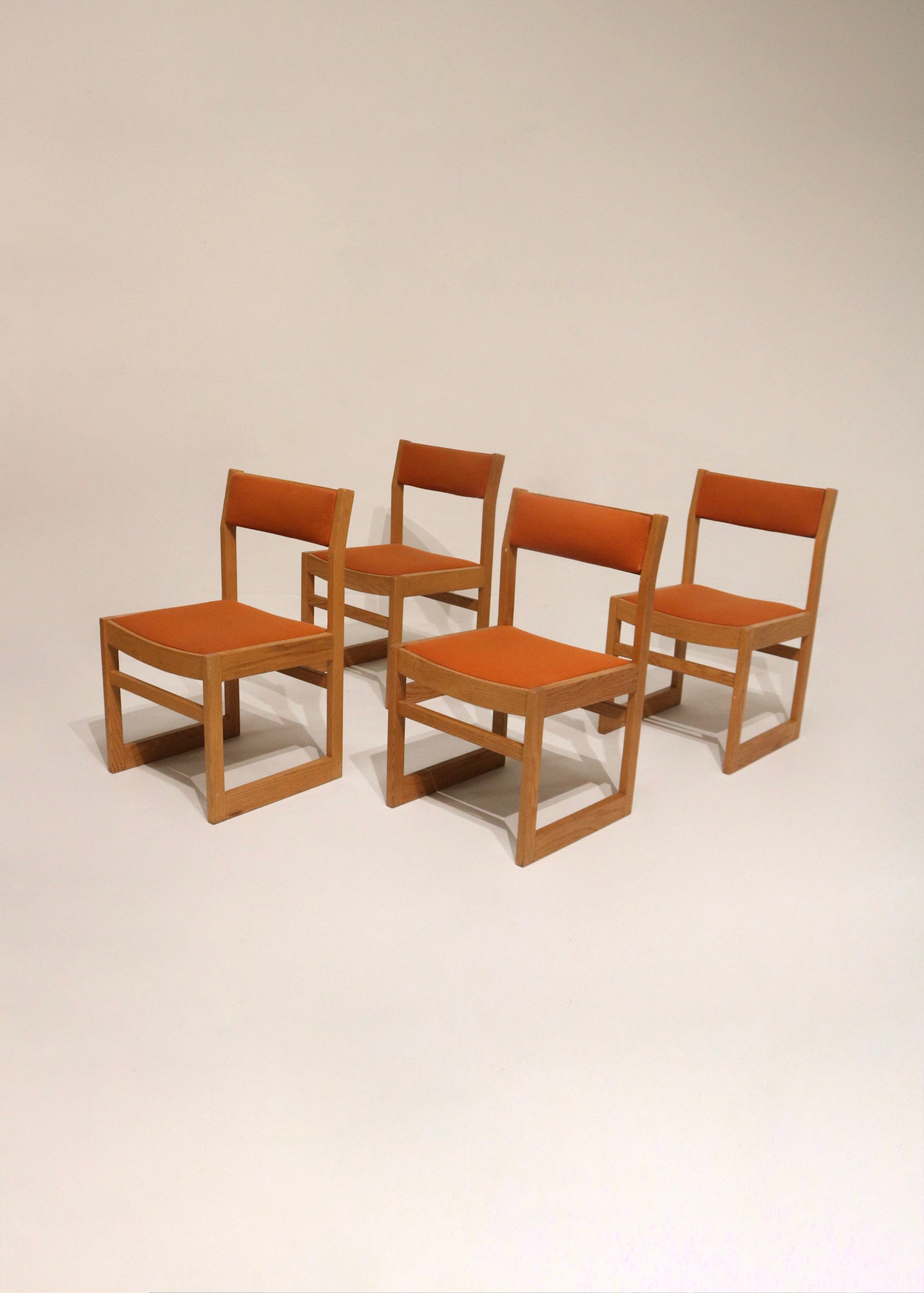 Main view of set of 4 Vintage MCM Jasper chairs with light oak solid wood frames and orange tweed upholstery, full set view for dining.