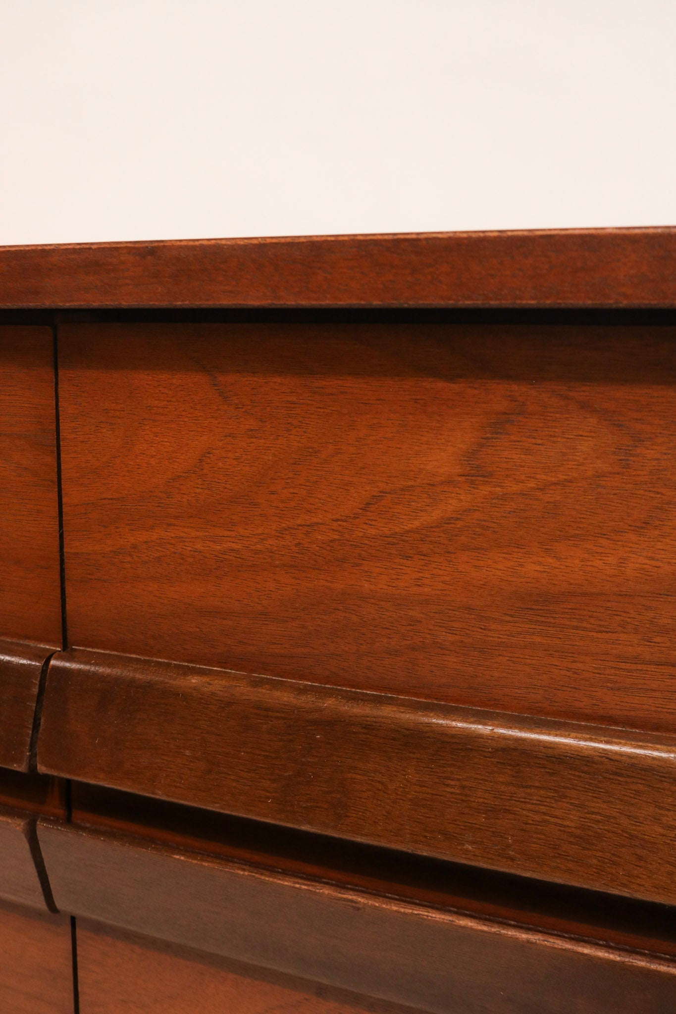 Full side profile of lowboy dresser in NYC studio setup emphasizing classic lines and proportions
