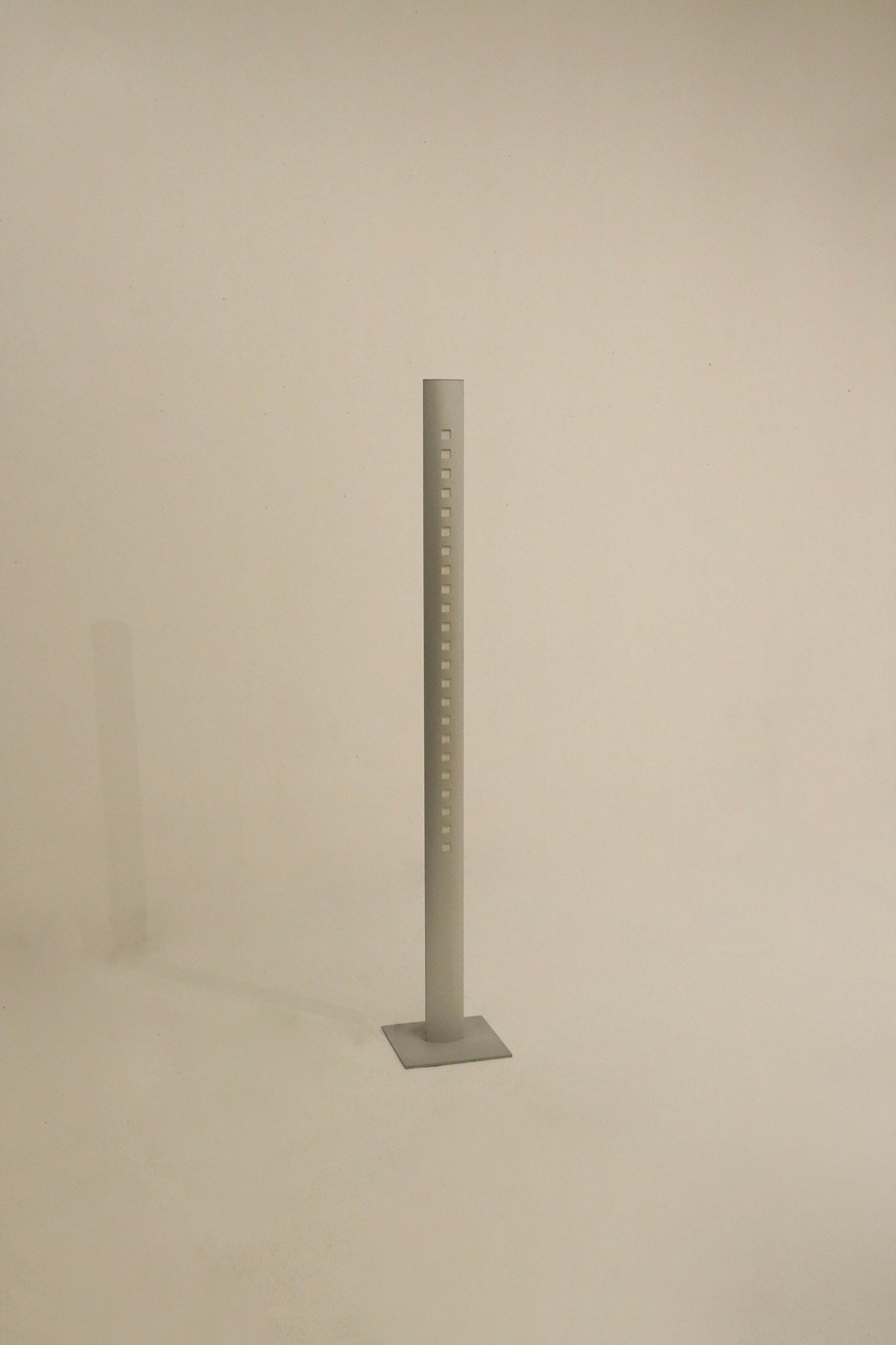 Ligne Roset Extensia Floor Lamp in a stylish living room