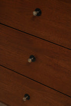 Detailed view of the sturdy walnut wood drawer construction and dovetail joints