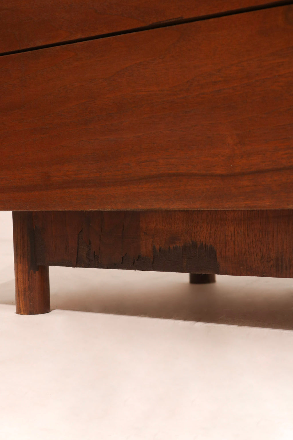 Back view of dresser frame constructed in solid walnut showcasing preserved vintage condition