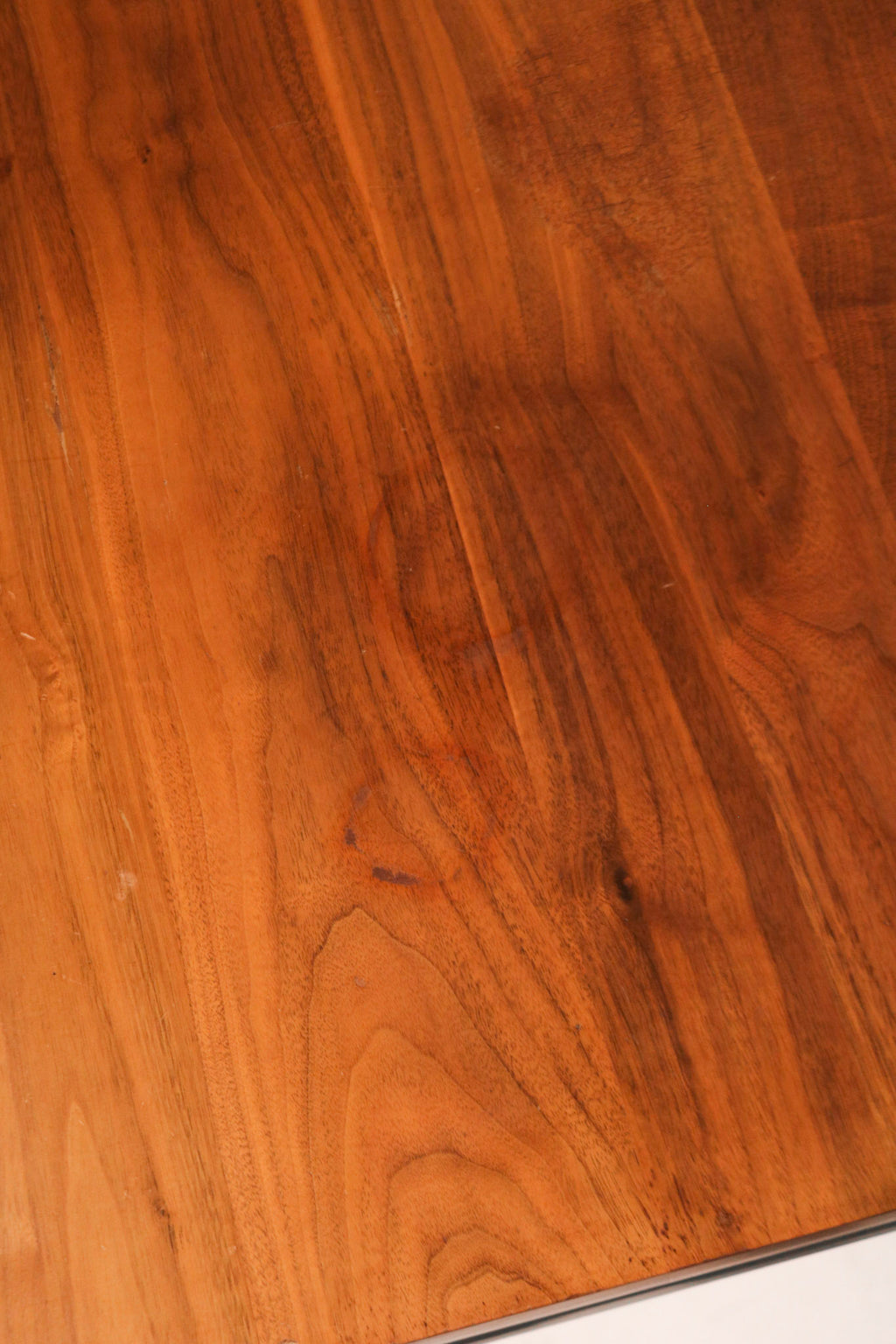 Underside view revealing steel support structure and table construction build quality