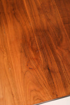 Underside view revealing steel support structure and table construction build quality