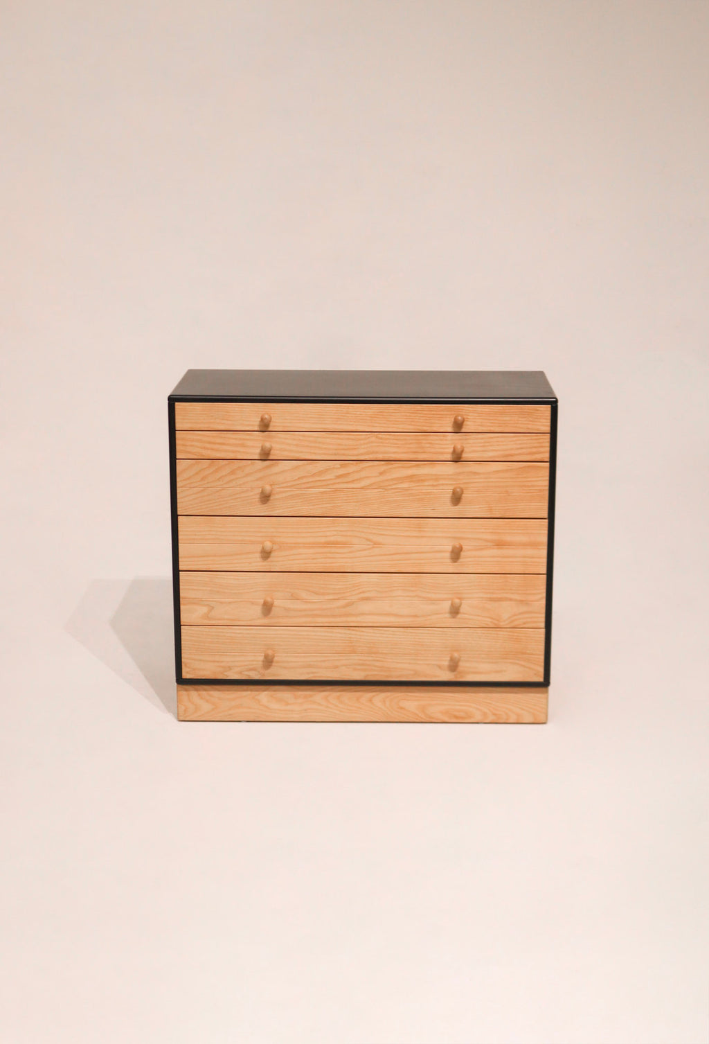 Main view of Scandinavian modern small wood dresser made of solid pine with minimalist Danish design