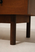 Side view of the dresser highlighting the clean design and wood finish