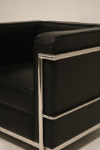 Angular view showing depth and layout of the chrome frame and cushions