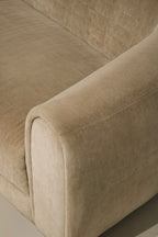 Rear and overall condition view of Contemporary West Elm champagne velvet sofa, even color, clean back panels and only minor wear from gentle use