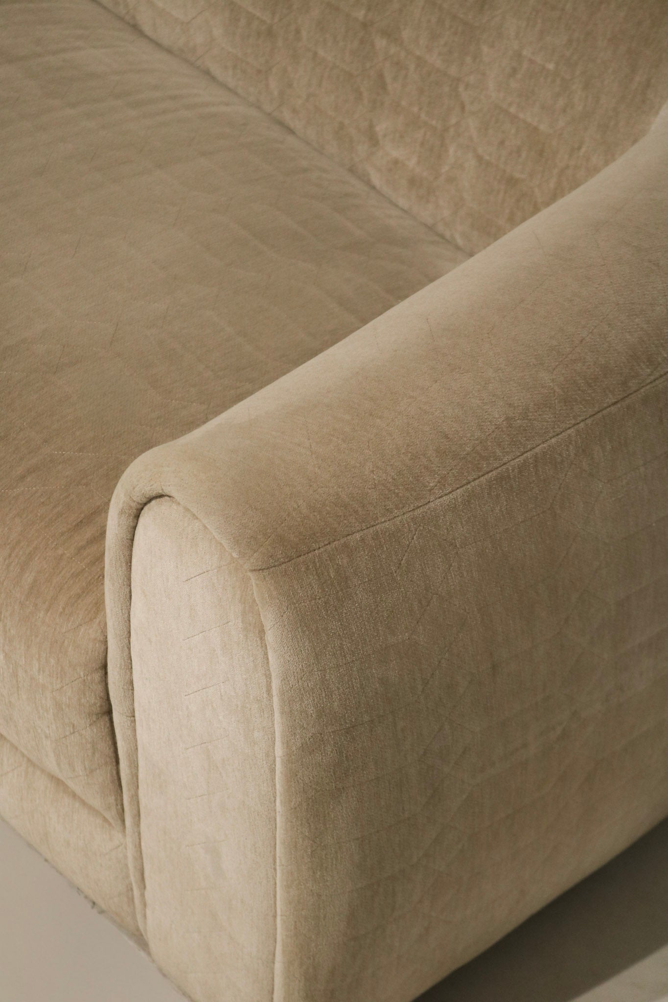 Rear and overall condition view of Contemporary West Elm champagne velvet sofa, even color, clean back panels and only minor wear from gentle use