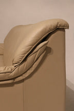 Underside view showing sofa base and visible hardwood leg construction, quality built