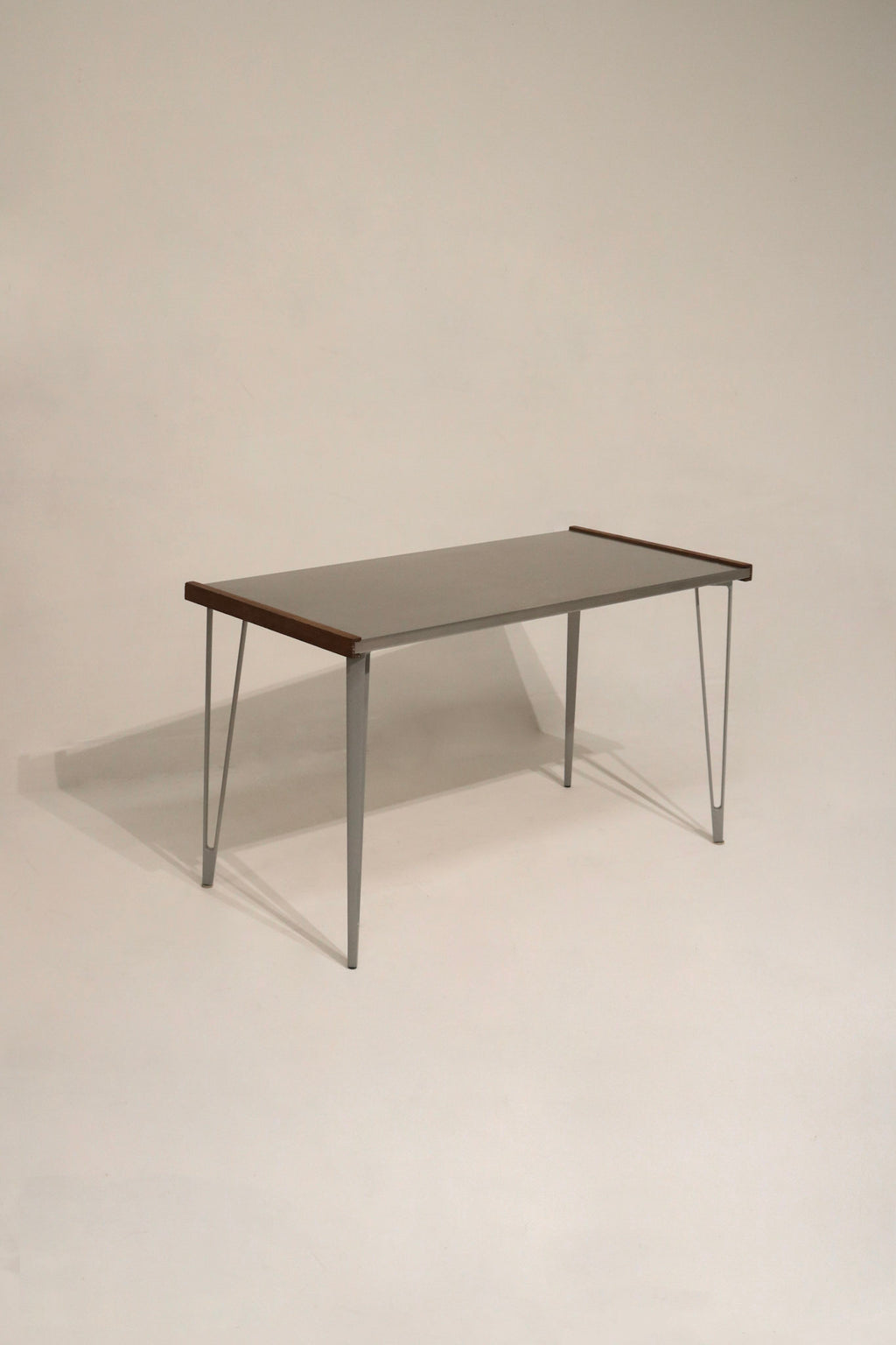 Heavy-duty steel table with iron legs and wood sides