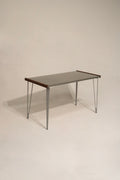 Heavy-duty steel table with iron legs and wood sides