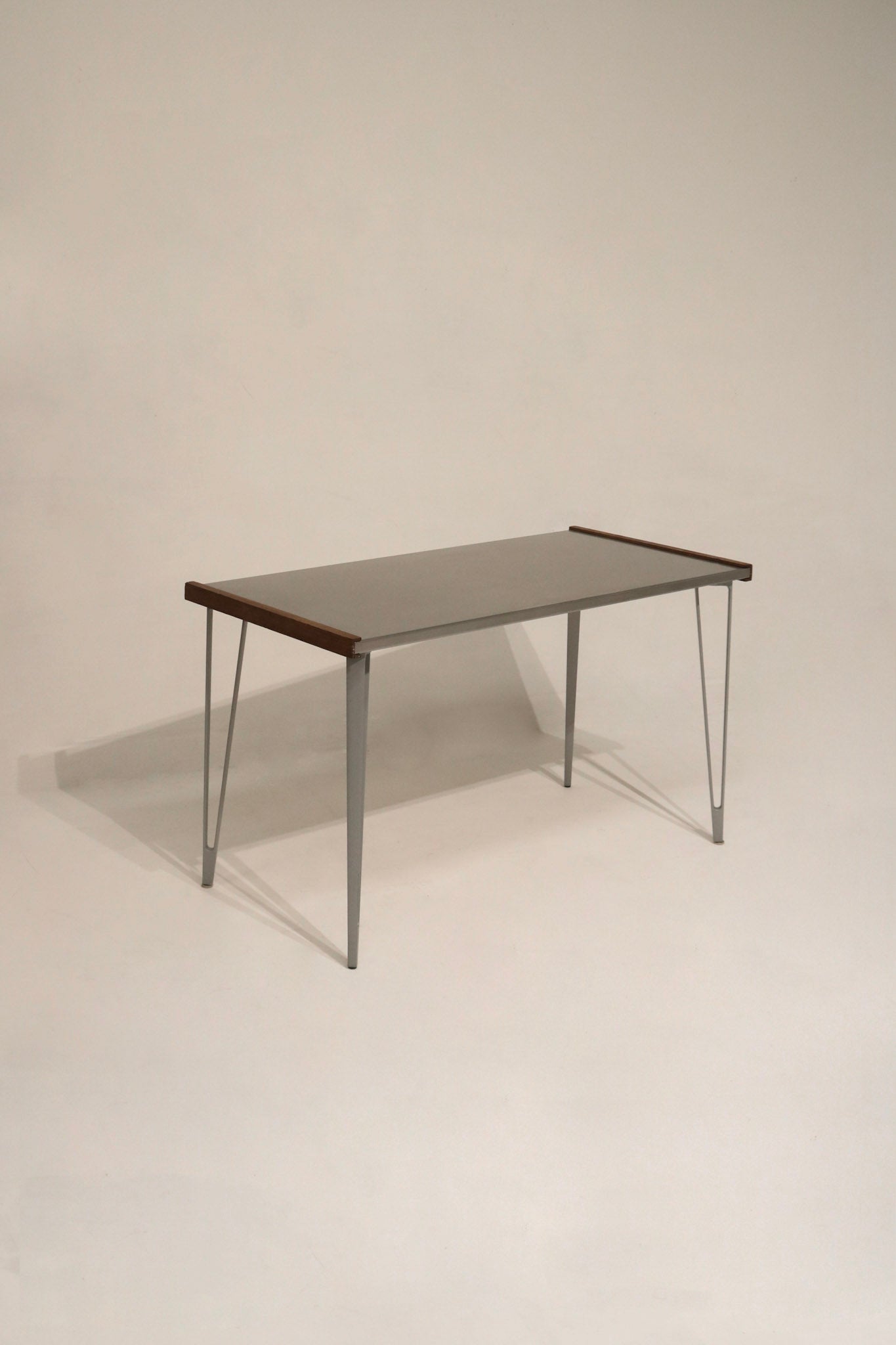 Heavy-duty steel table with iron legs and wood sides