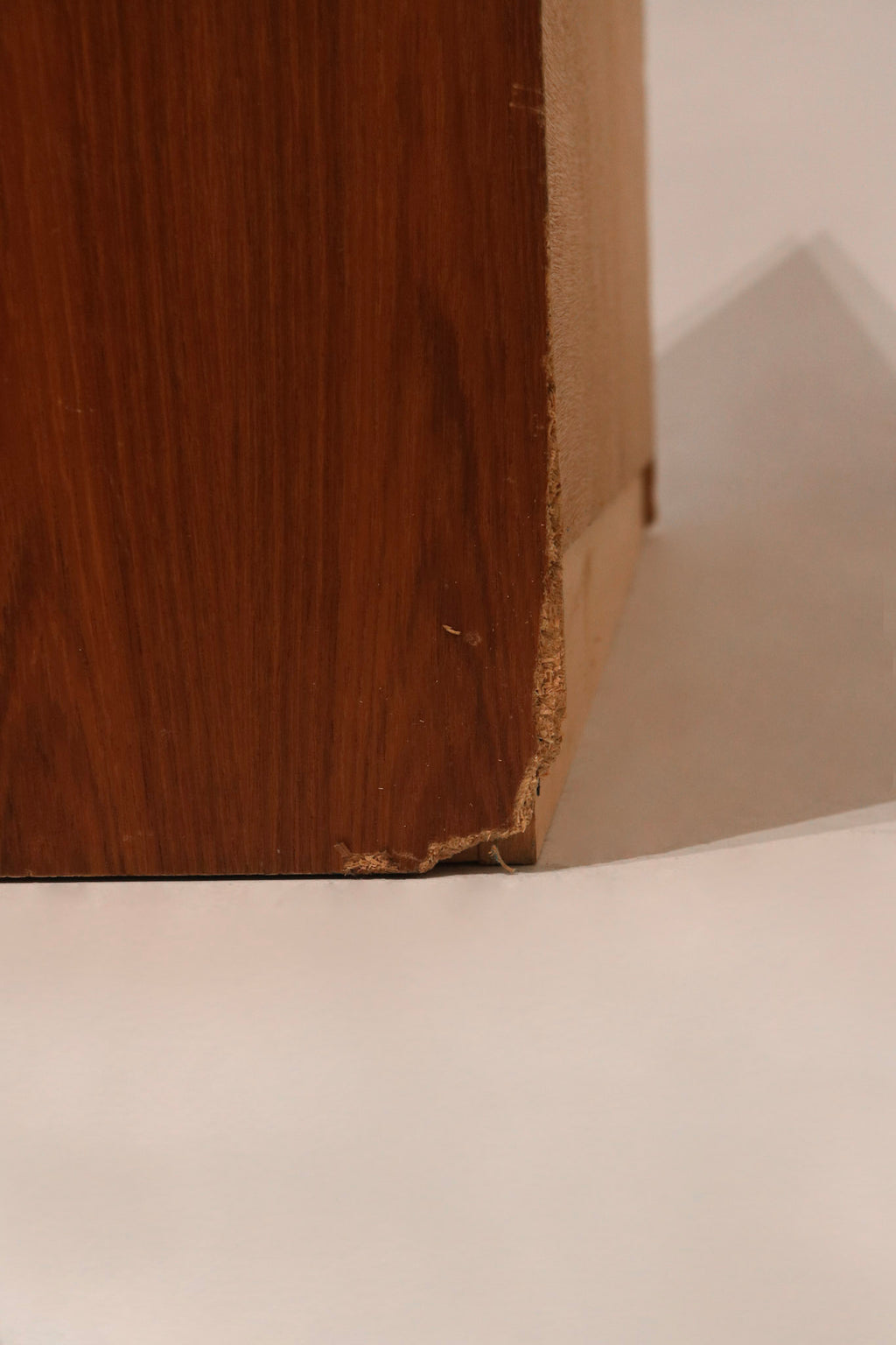 Open drawers showing interior space and dovetail joins in the teak wood dresser
