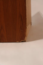 Open drawers showing interior space and dovetail joins in the teak wood dresser