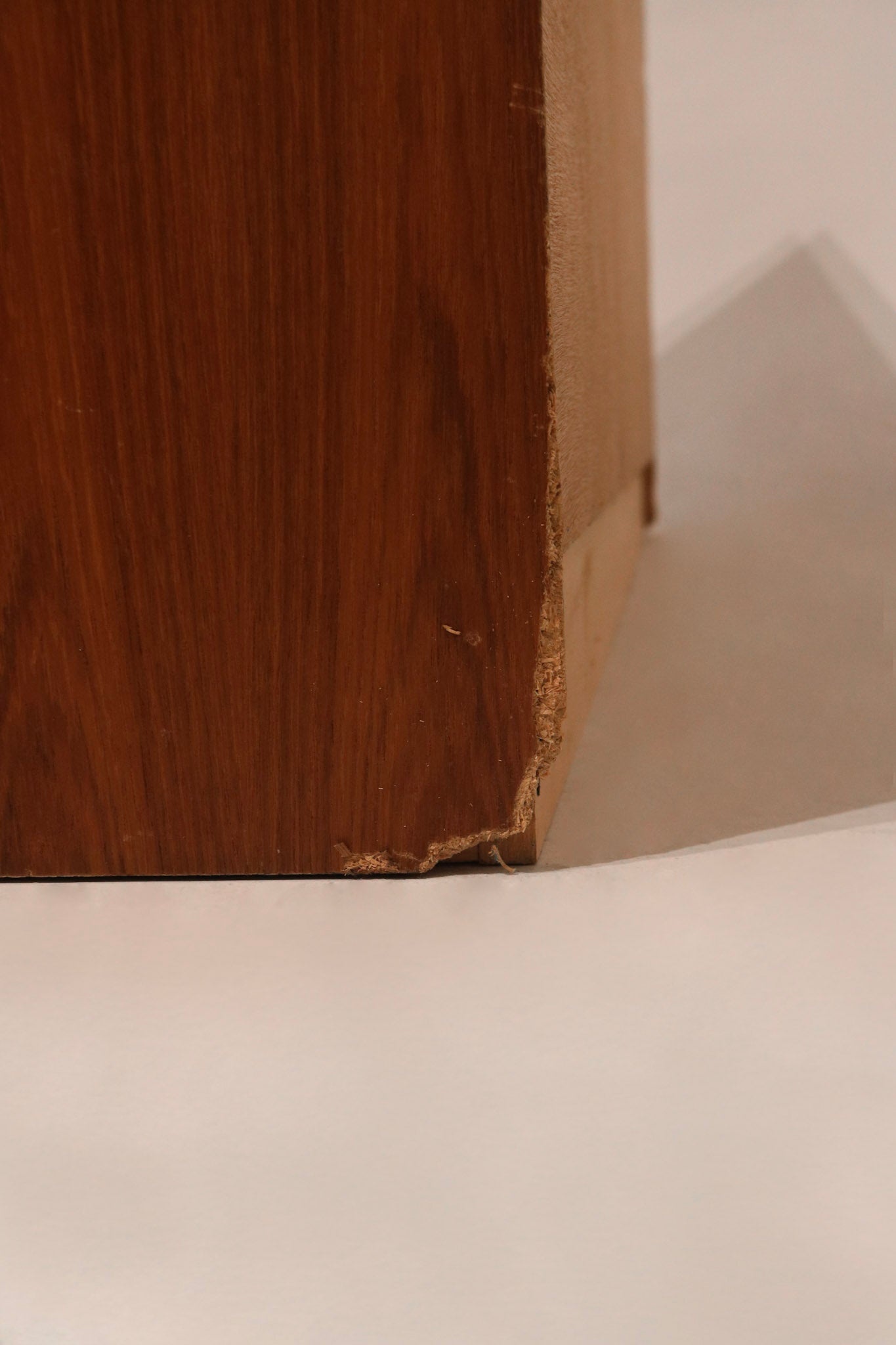 Open drawers showing interior space and dovetail joins in the teak wood dresser