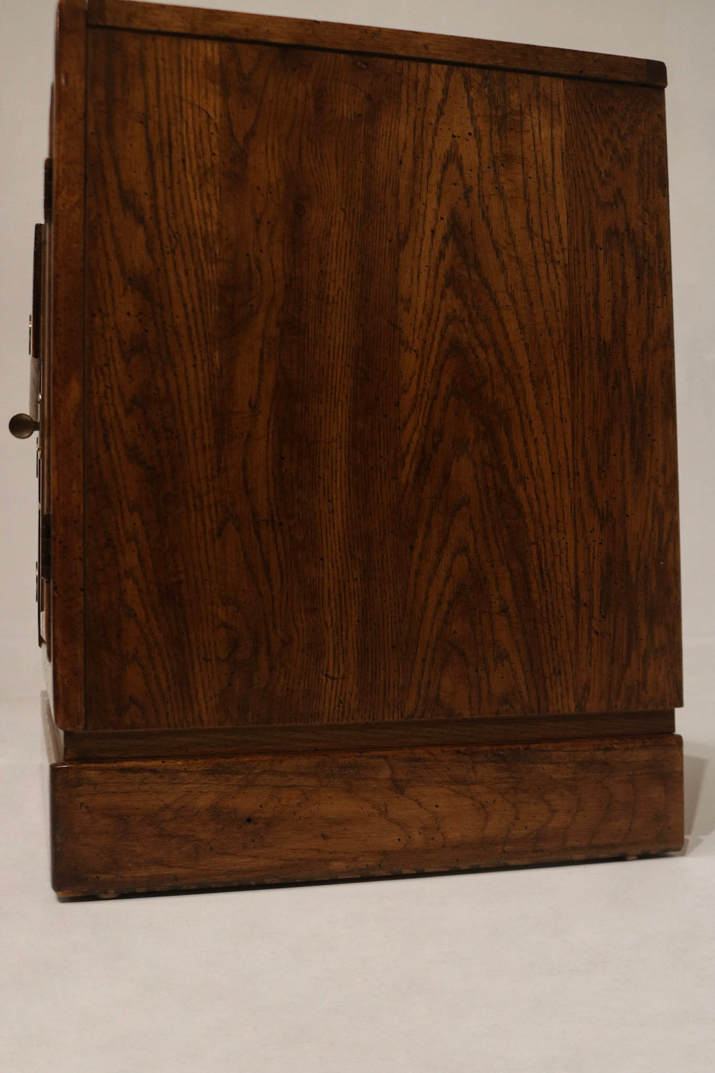 Drawer bottom and interior finish detail showing solid wood panels, clean interior surfaces and well-maintained vintage storage condition. Perfect for NYC apartments.