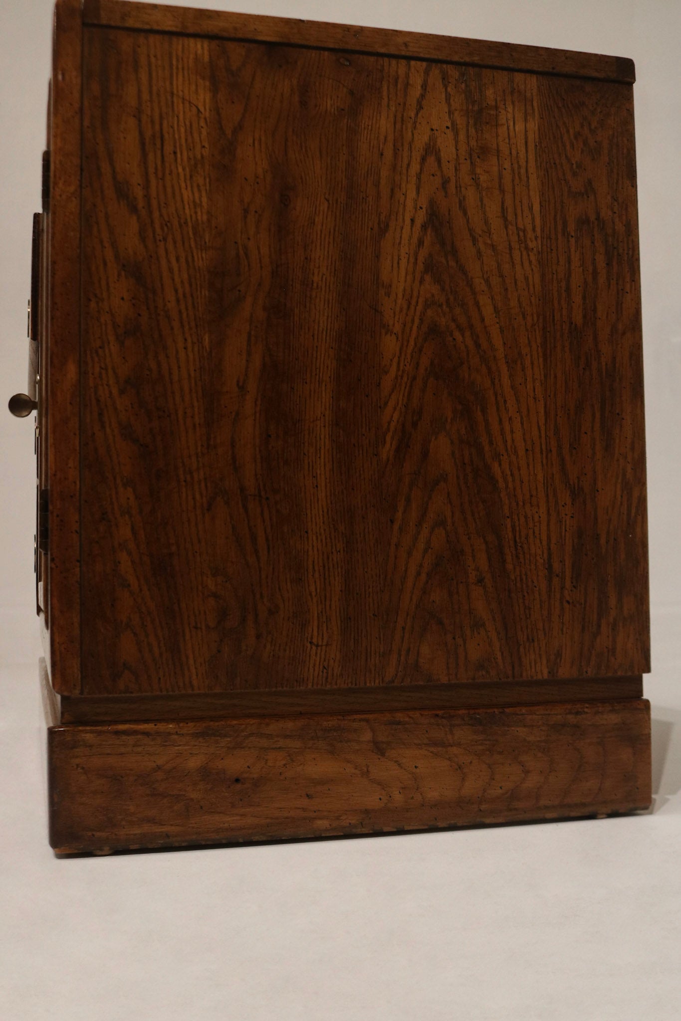 Drawer bottom and interior finish detail showing solid wood panels, clean interior surfaces and well-maintained vintage storage condition. Perfect for NYC apartments.