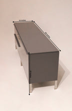 Size diagram showing dimensions of the lacquered Capellini TV Unit: 69in L x 19in D x 26in H