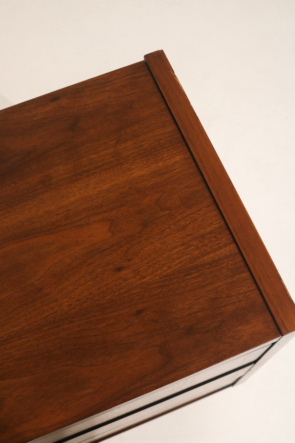 Open drawer interior showing solid build, smooth glides and roomy storage, walnut fronts with sturdy interior construction