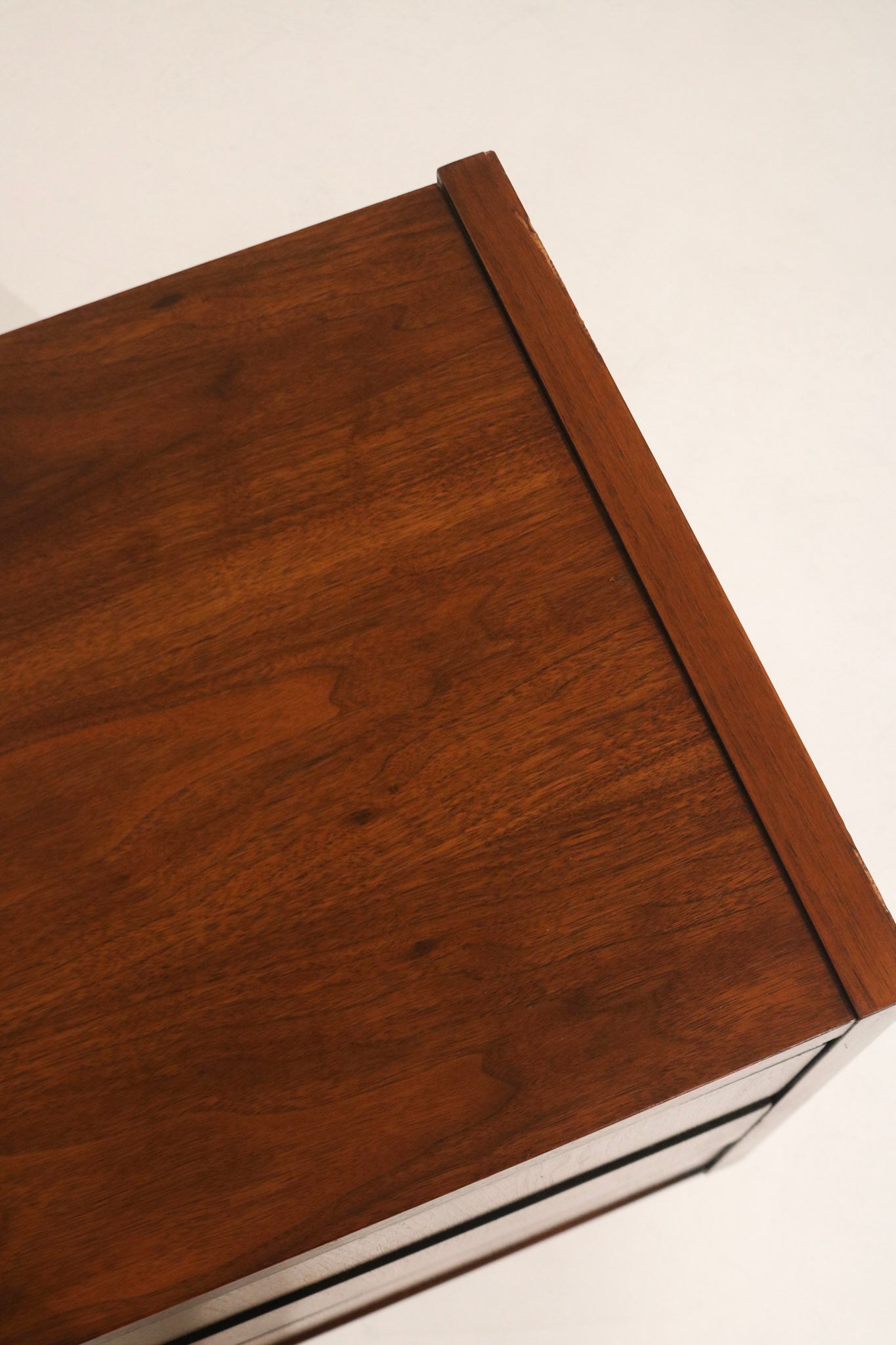 Open drawer interior showing solid build, smooth glides and roomy storage, walnut fronts with sturdy interior construction