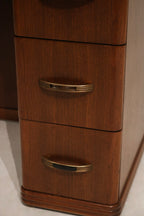Detail: finish texture close-up of walnut wood tabletop showing visible wood grain, light sheen and small surface scratch
