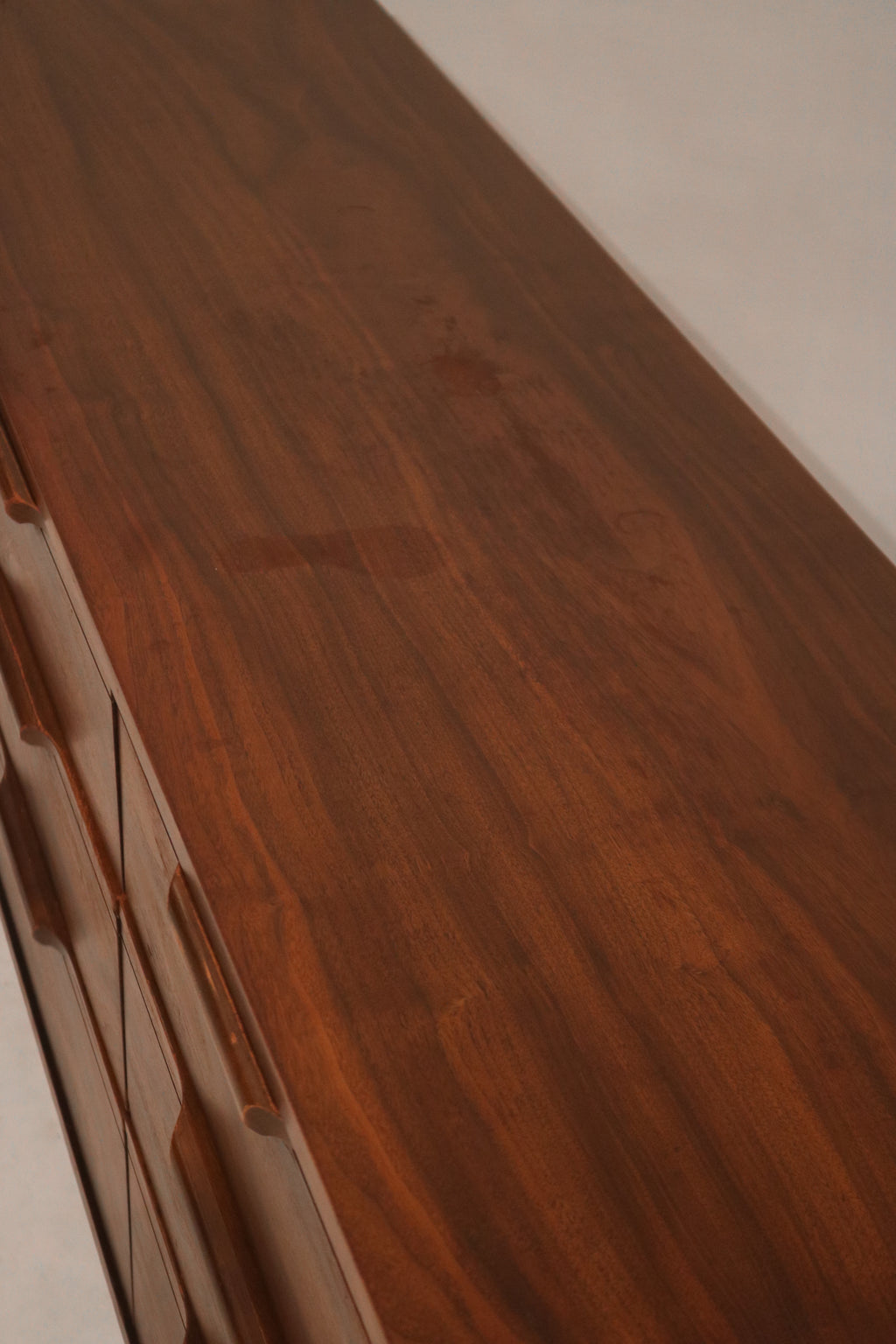 Detailed corner shot of the dresser illustrating joinery and walnut wood detail