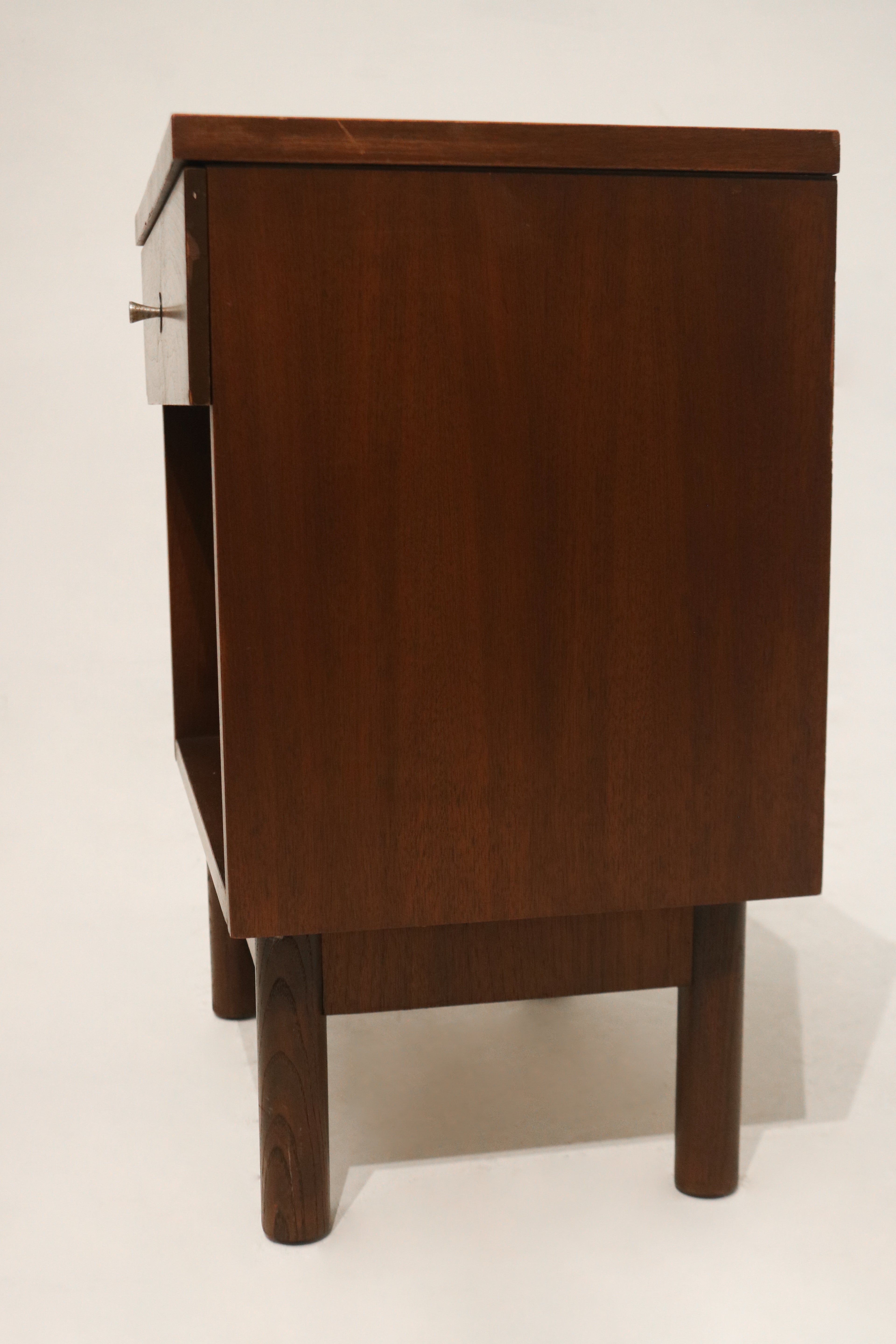 Top-down view showcasing veneer top with natural wood patterns and minor imperfections