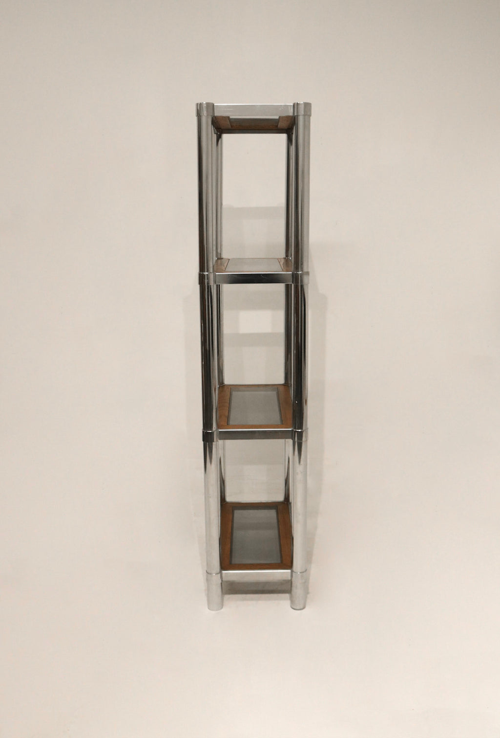 Side angle view of Vintage Chrome Glass Wood Bookcase showing clean lines and multi-level shelves
