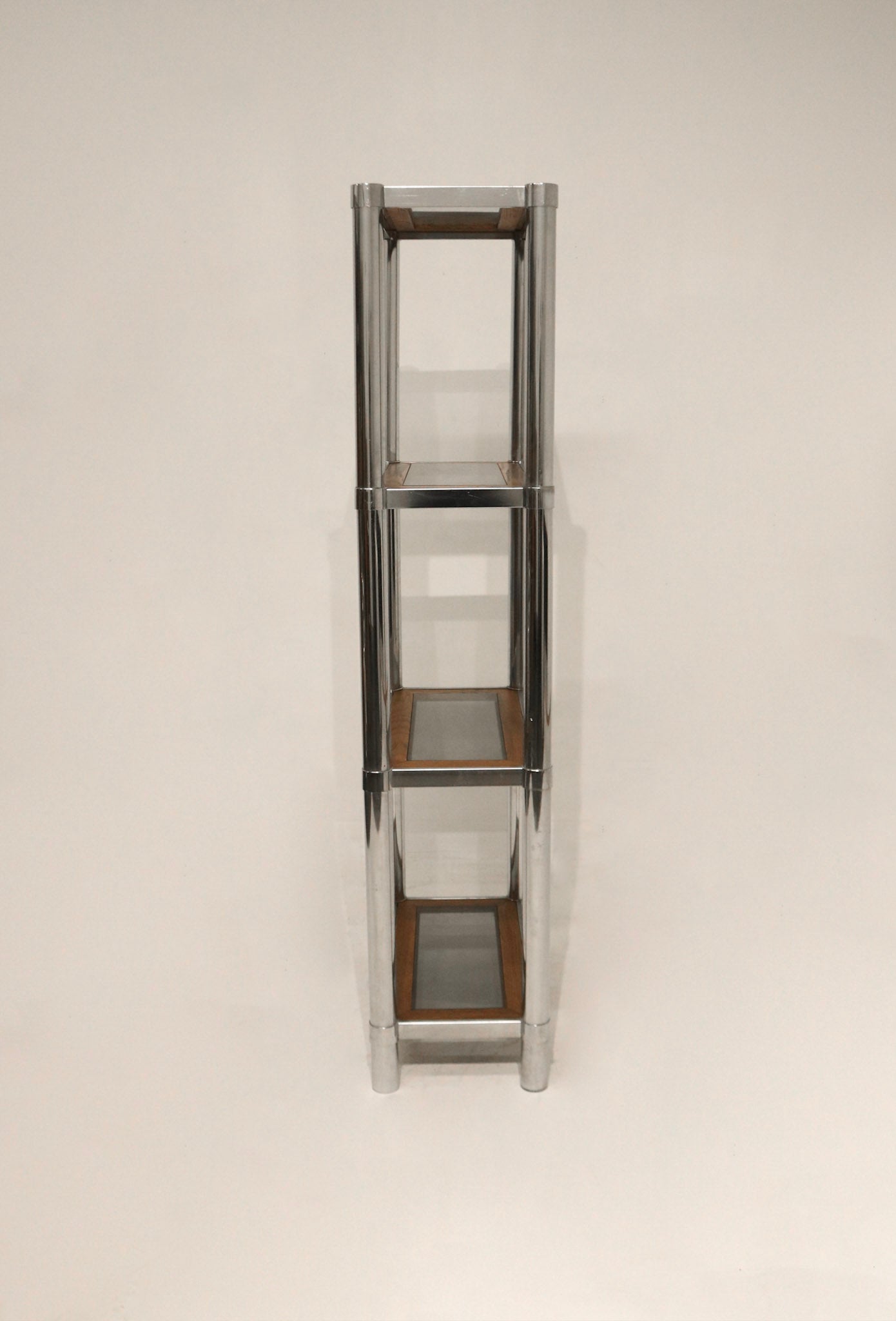 Side angle view of Vintage Chrome Glass Wood Bookcase showing clean lines and multi-level shelves