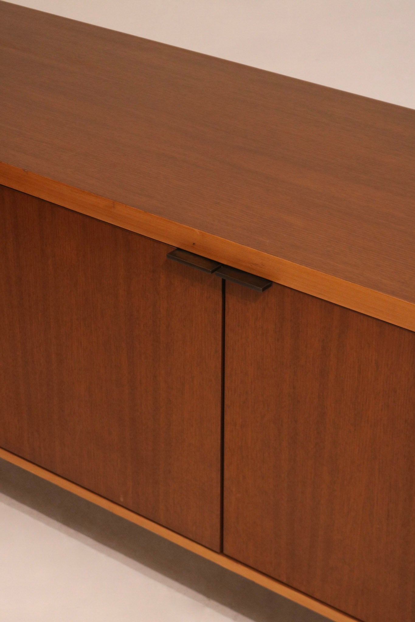 Detail of heavy silver-toned metal base showcasing industrial style and sturdy construction