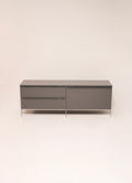 Front view of the Capellini modern lacquered wood TV unit with sleek metal base