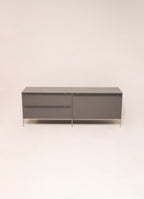 Front view of the Capellini modern lacquered wood TV unit with sleek metal base