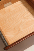 Corner angle highlighting seamless wood joinery and surface wear consistent with age