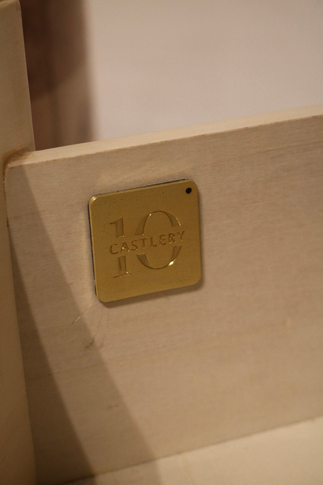 Detailed corner shot showcasing high-quality poplar burl veneer and bentwood design