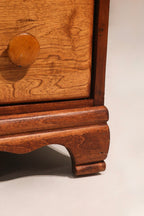 Angle view of all drawers partially open revealing interior condition and build