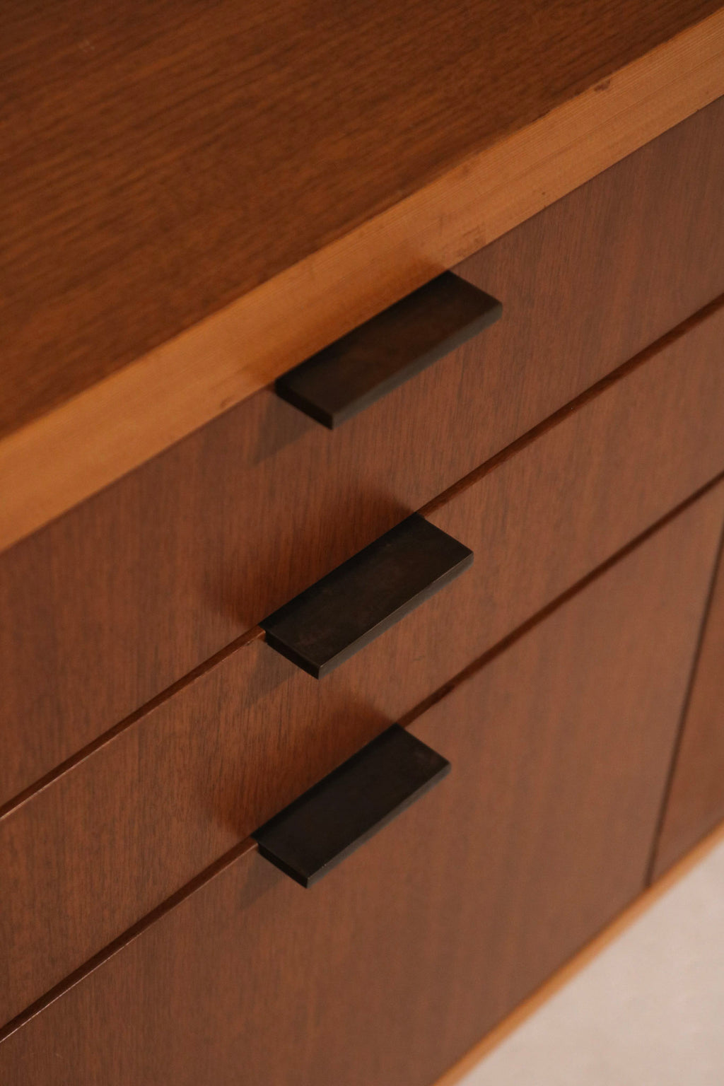 Back view of credenza showing subtle scratch, overall in well-preserved condition