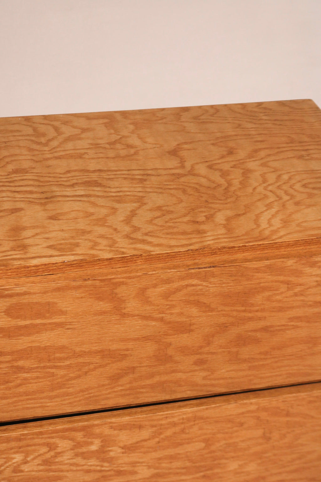 Drawer interior in plywood with clean lines and sturdy build, showing functionality