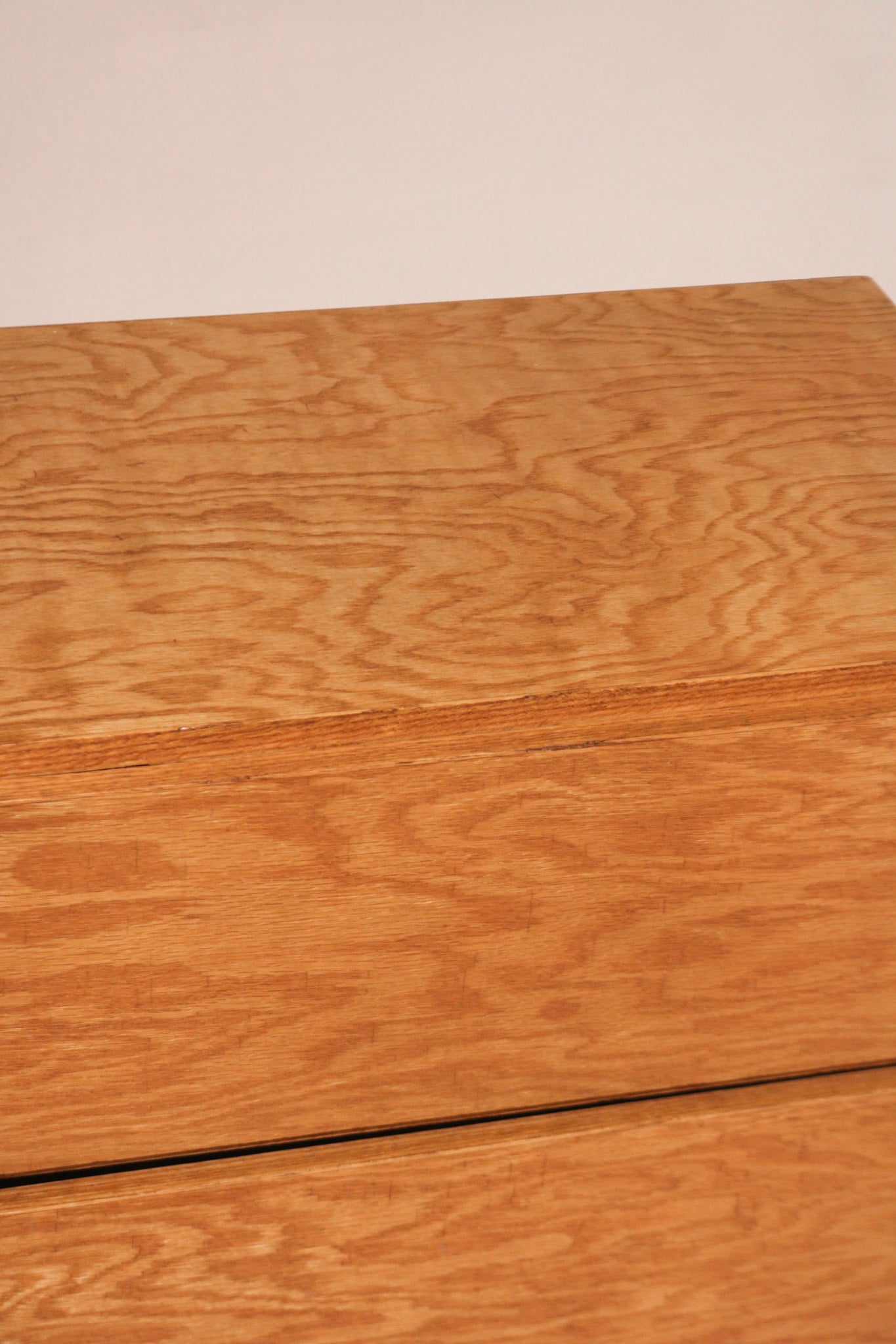 Drawer interior in plywood with clean lines and sturdy build, showing functionality