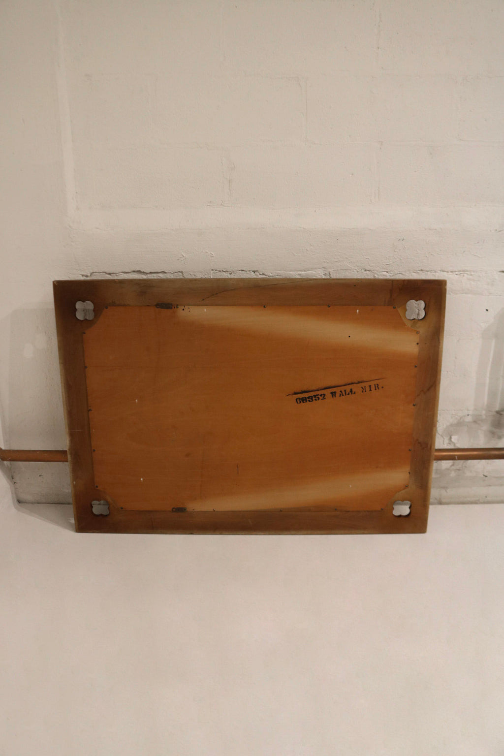 Finish detail on solid oak wood frame showing light surface scratches, worn corners, varnish wear and vintage character.