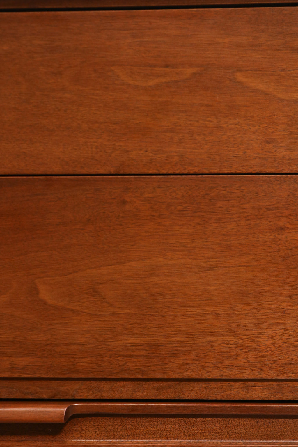Interior view of drawer to show clean walnut wood and smooth sliding mechanism