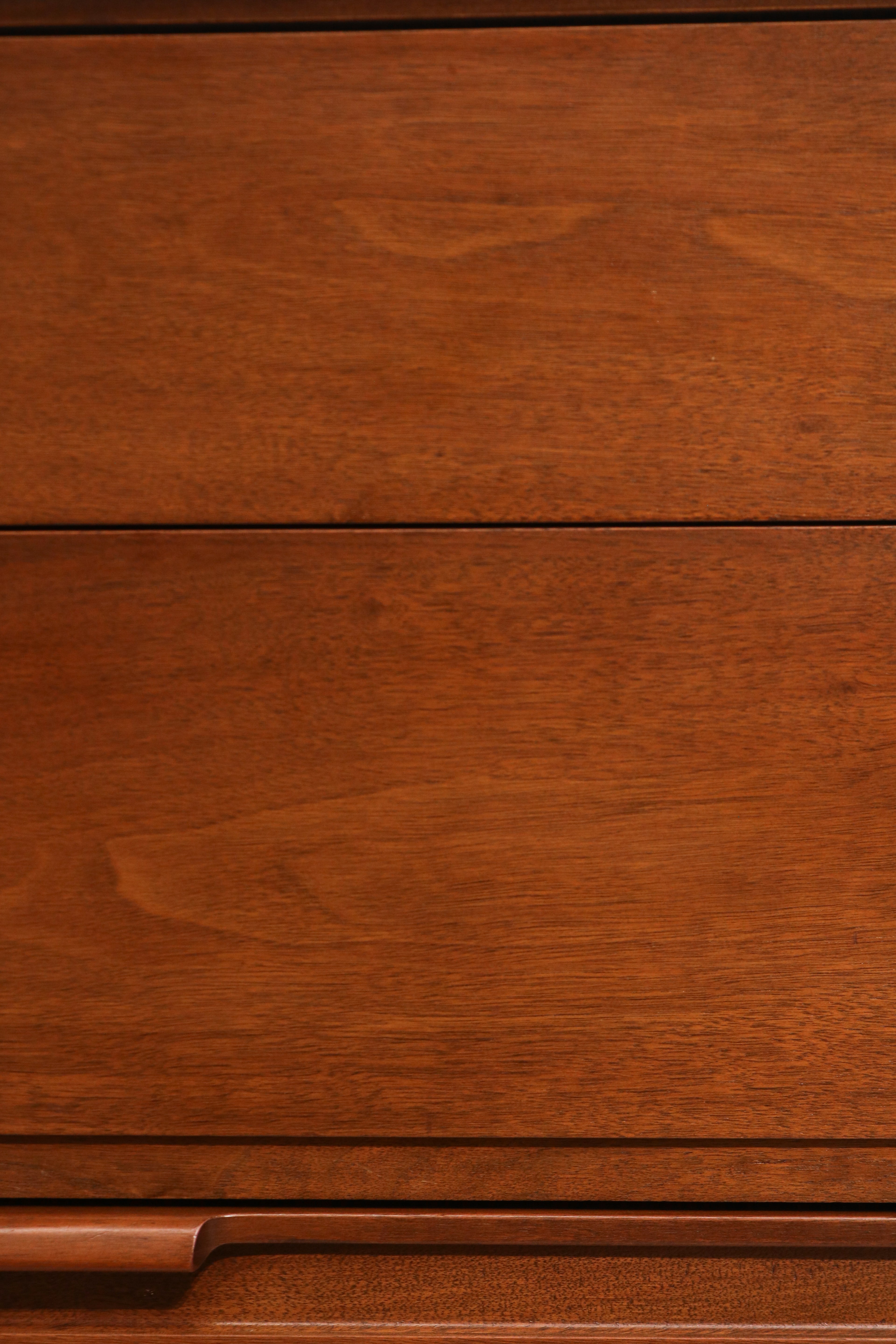 Interior view of drawer to show clean walnut wood and smooth sliding mechanism