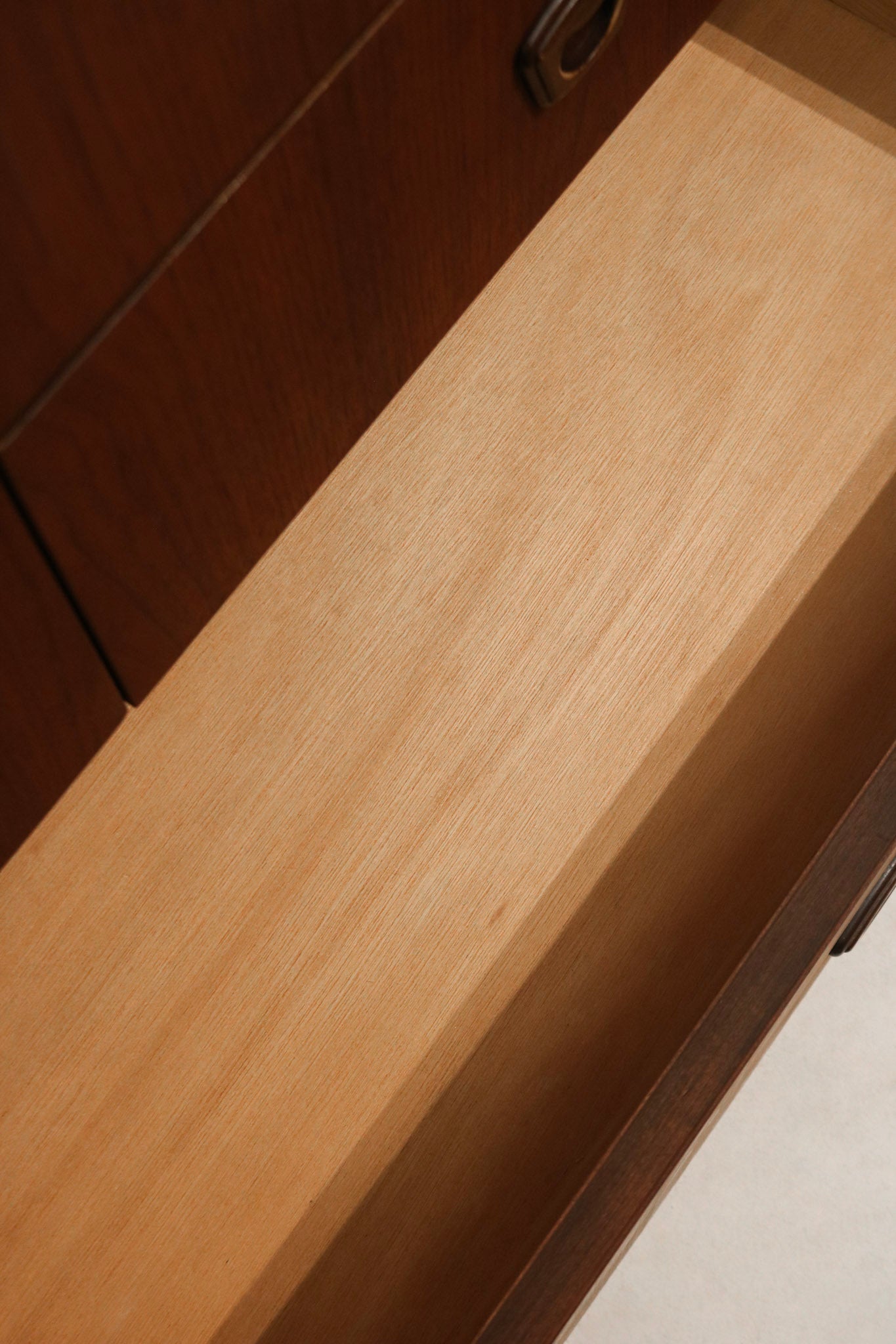 Texture detail of walnut surface showing the natural American walnut finish